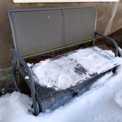 Outdoor rocking bench