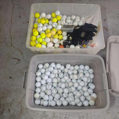 Two Bins Of Golf Balls With Extras