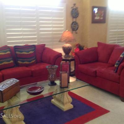 Red sofa and loveseat