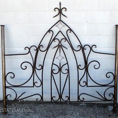 decorative wrought iron panel turned into queen size headboard