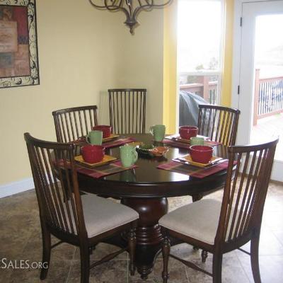 6 Pc Kitchen Set - Table is 52 inches wide, with an extender to make the round table oblong! 