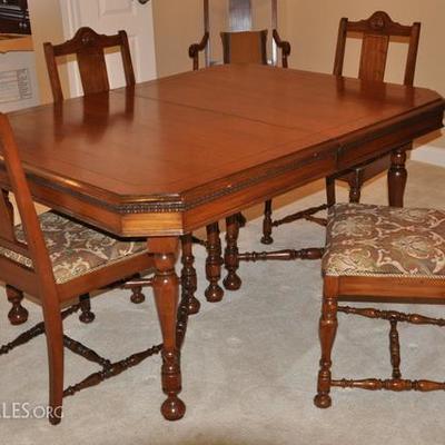 Antique table with 6 chairs made by The JAKE Tennenbaum Company in Cincinnati, OH