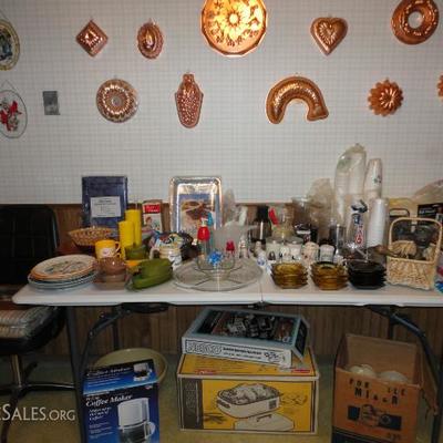 Various jello molds displayed and miscellaneous Kitchen utinsels 