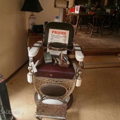 1920's Vintage Barber Chair with accessories.