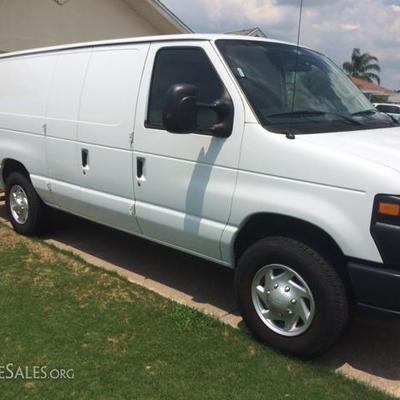 Ford E-250 Super Duty White Work Van. 24,000 miles pre-offers accepted by email. Price is $19,999.00