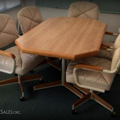 Hard to find dining room set with "comfortable" swivel rolling chairs!
