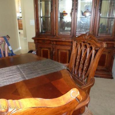 beautiful wood stain. LIKE NEW. 1500.00 sold with hutch. MATCHES the tea server 350.00 (sold seperately)