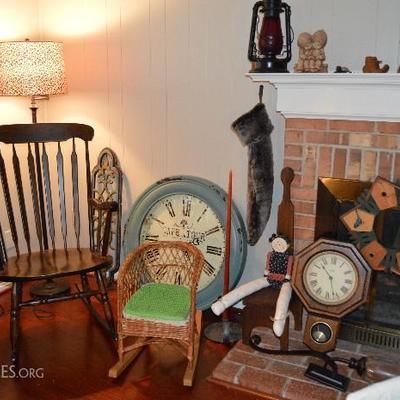 Rocking chair - very nice wood.  Extra large wall clock.  Wrought iron art.  Floor lamp.  Cute kids rattan rocking chair
