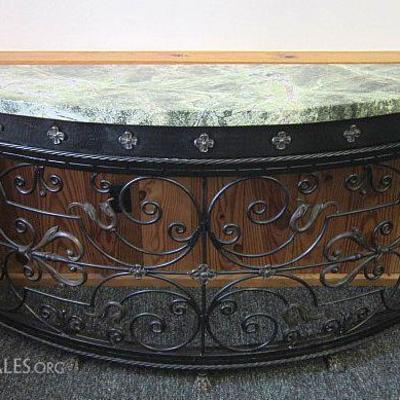 Magnificent Morgan Hill credenza/table with heavy ornate metal base, claw feet, rope trim, medallions, and a marble top