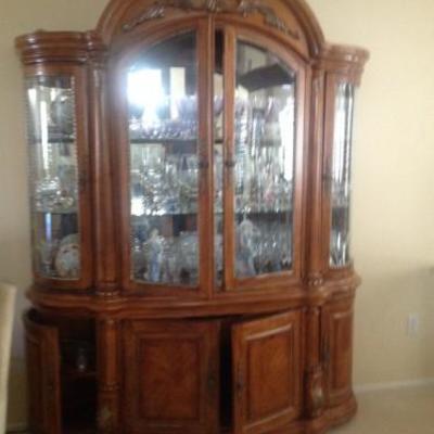Beautiful formal dining room furniture includes this china cabinet