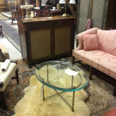 French regency sideboard, Brass and glass cocktail table, chippnedale sofa