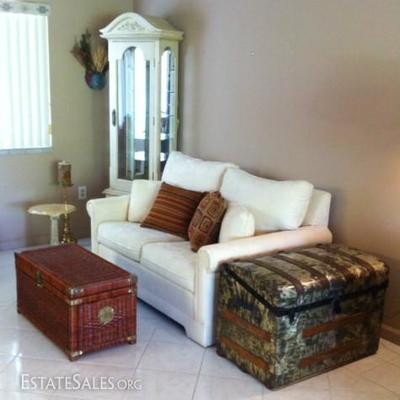 Love seat, steamer trunk, wicker chest, curio, marble accent table.