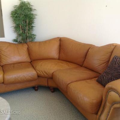Leather crescent shaped sectional