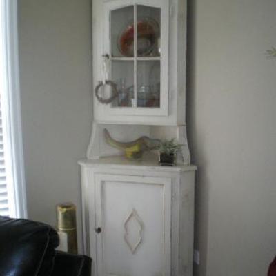 white corner cabinet