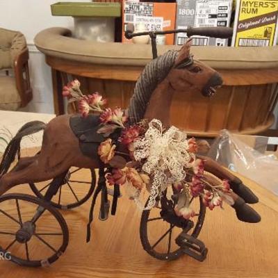 Hand carved horse,moving, iron wheels.