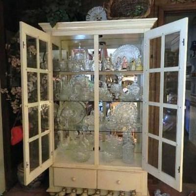 China cabinet with glass pane doors. Huge crystal collection