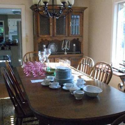 Heavy oak table with 6 chairs, china.