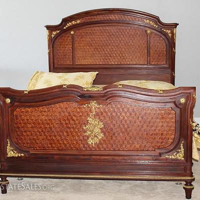 A Louis XVI style mahogany, tulipwood and rosewood 3-piece bedroom suite; Queen size bed, armoire and side table.