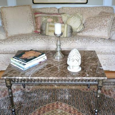 Damask sofa and marble top coffee table