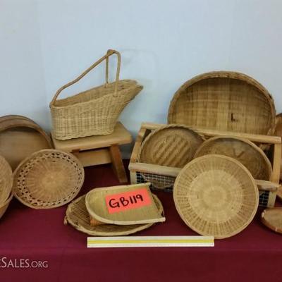 A lot of wicker baskets and wooden stool