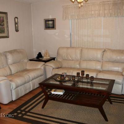 Reclining Sofa and Love Seat with matching coffee table and end tables