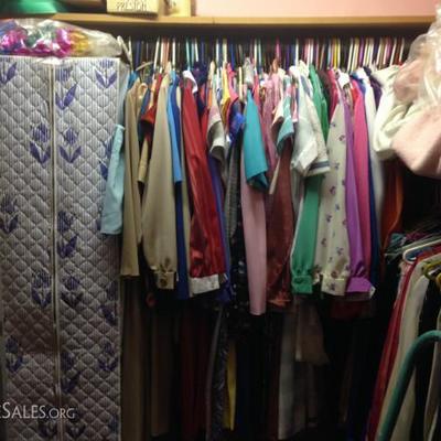 Walk-in closet full of vintage clothing, '80s or earlier