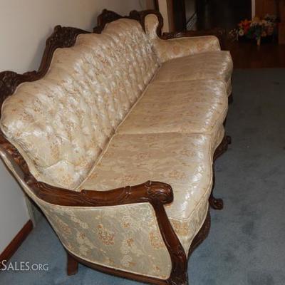 Victorian couch, always had plastic cover never been sat on 