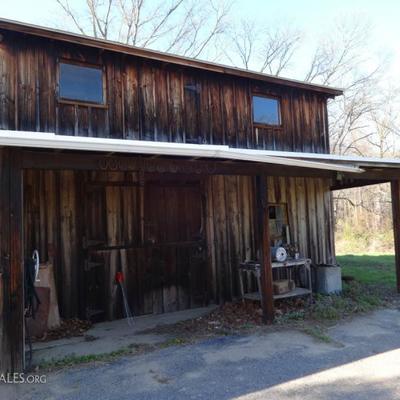 2 Story Barn, There are 2 Barns, a Large 2 car garage and a shipping container ++