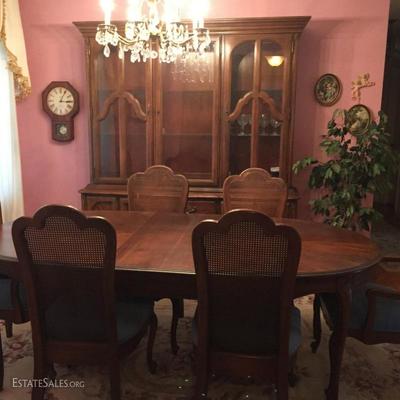 French provincial Table and 6 chairs.  China cabinet.