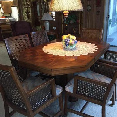 Game or dining table 6 arm chair 1 larger leaf $150. Now  OFFER