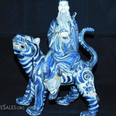 Ceramic Buddha Riding a Tiger