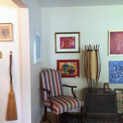 Hand-crafted broom,  upholstered arm chair, antique prayer rug, MCM teak table lamp (Adrian Pearsall Modeline?)