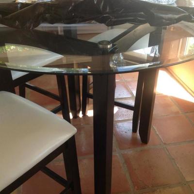 Black bistro style glass table and 4 chairs