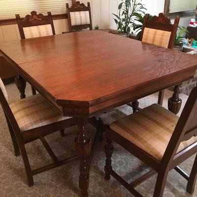 Carved antique Dining room table and chair set