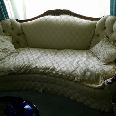 Mahogany tufted sofa
