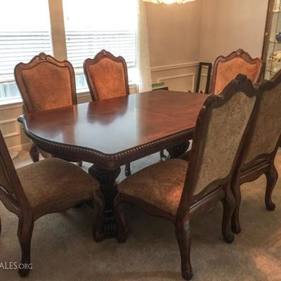 Almost new dining table with 10 chairs