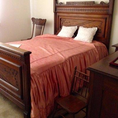 Antique hand carved full bed and matching dresser with mirror