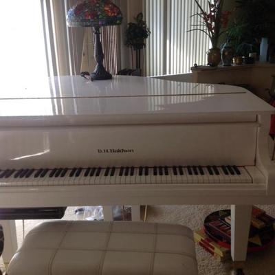 White baby grand piano and bench $2000