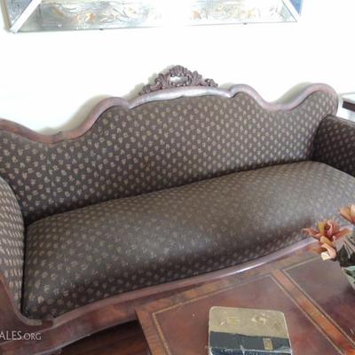 antique walnut sofa on casters