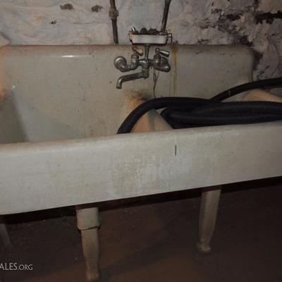 Porcelain double sink with soap dish and faucet