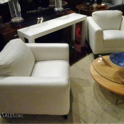 Pair modern design white leather chairs, matching sofa sold separately