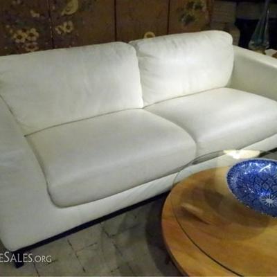 Modern design white leather sofa, matching chairs sold separately